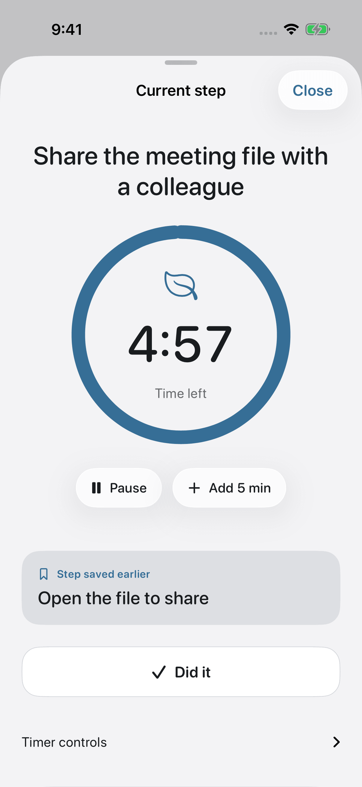 OK Planner’s focus timer in English, showing the current task, time left, a pause button, and a note for picking up where you left off.